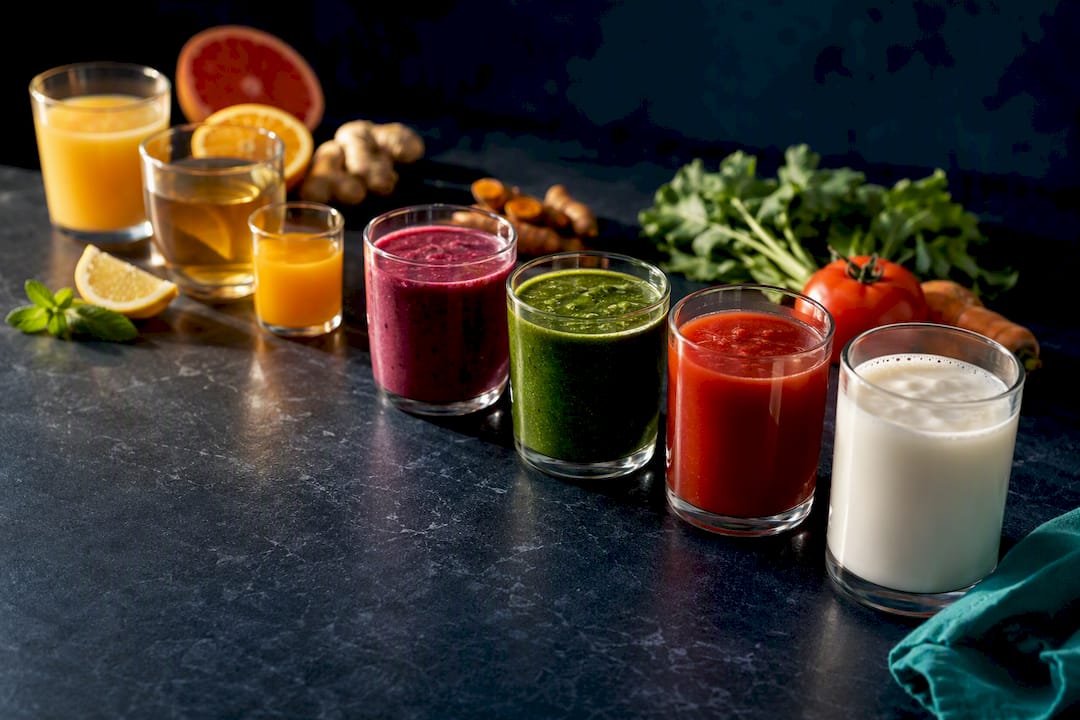 Assorted low sugar immunity drinks and ingredients
