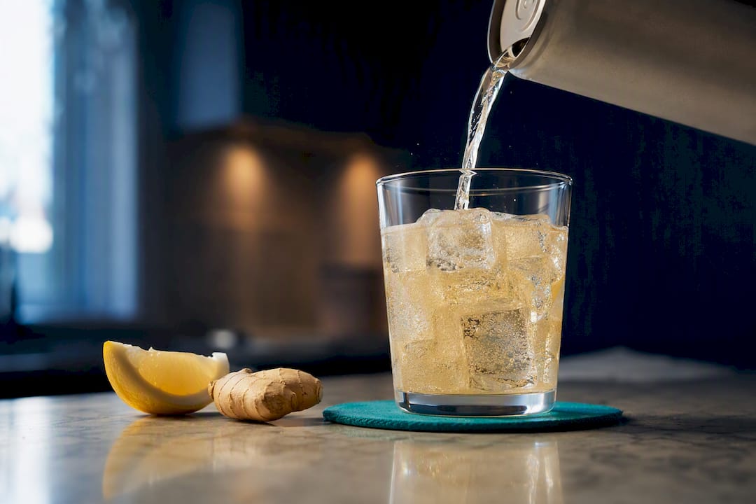 Sparkling lemon ginger tonic poured over ice